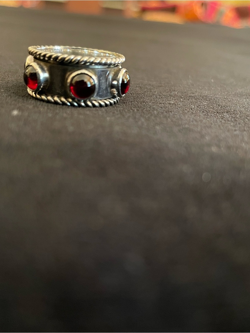 Sterling Silver Spinner Ring with Red Gem Accents